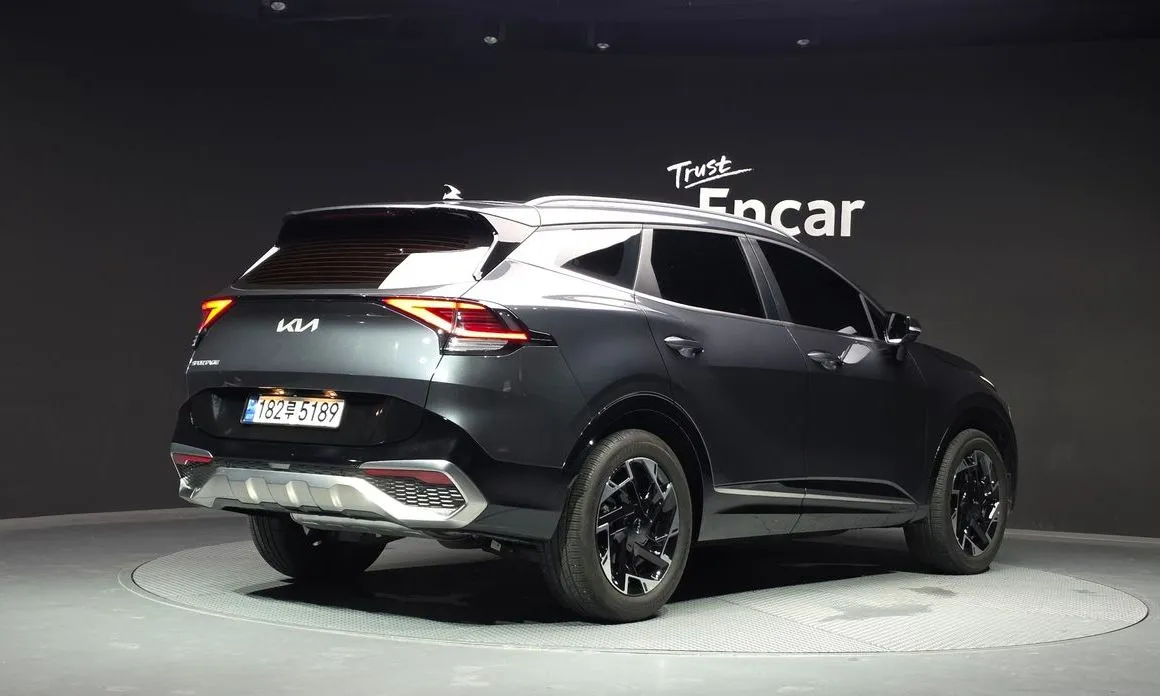 Kia Sportage — фото 10