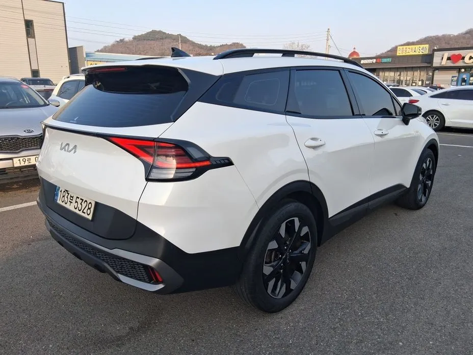 Kia Sportage — фото 7