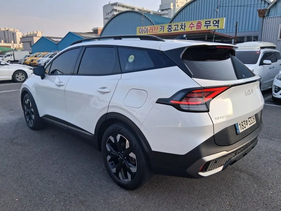 Kia Sportage — фото 10