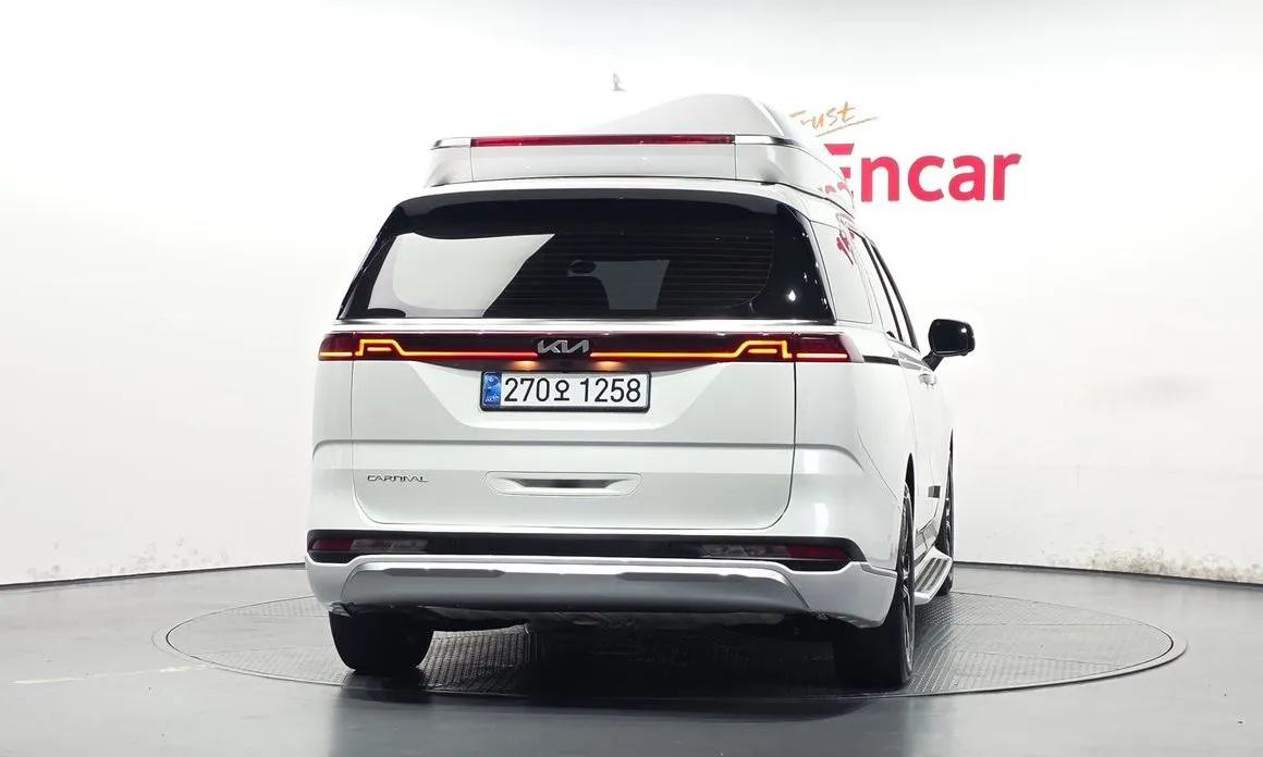 Kia Carnival — фото 10