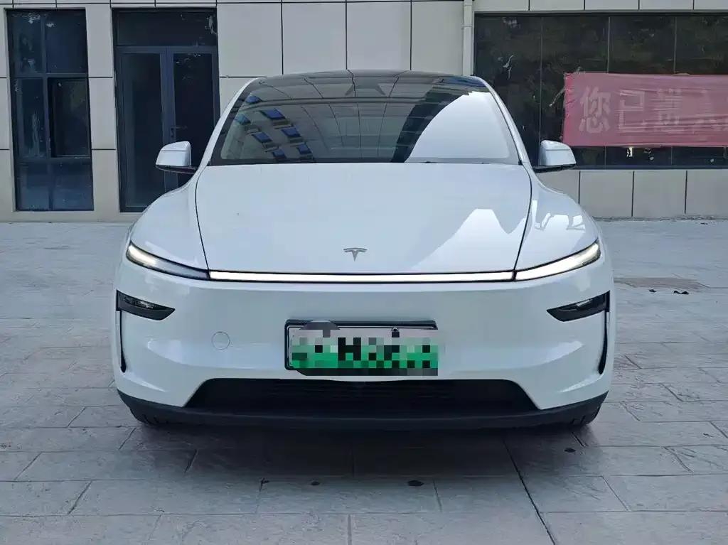 Tesla Model Y — фото 7