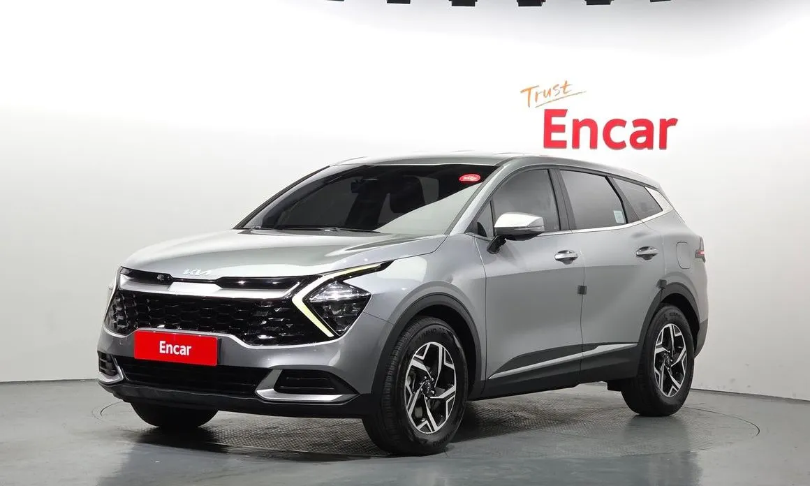Kia Sportage — фото 1
