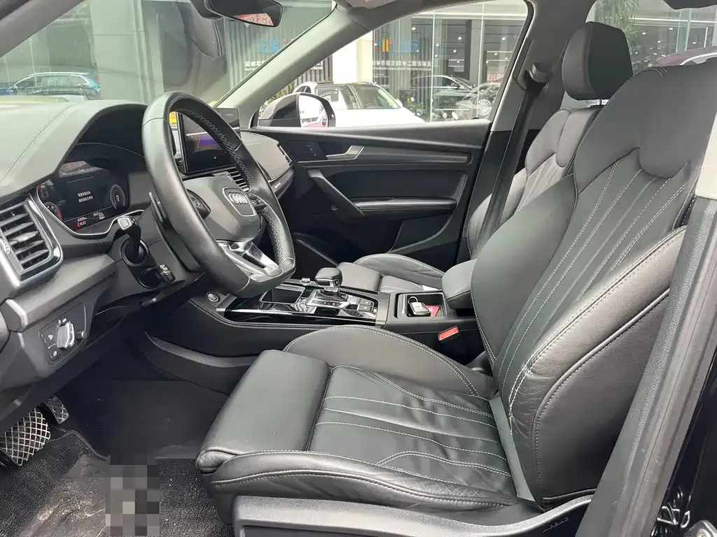 Audi Q5L — фото 5