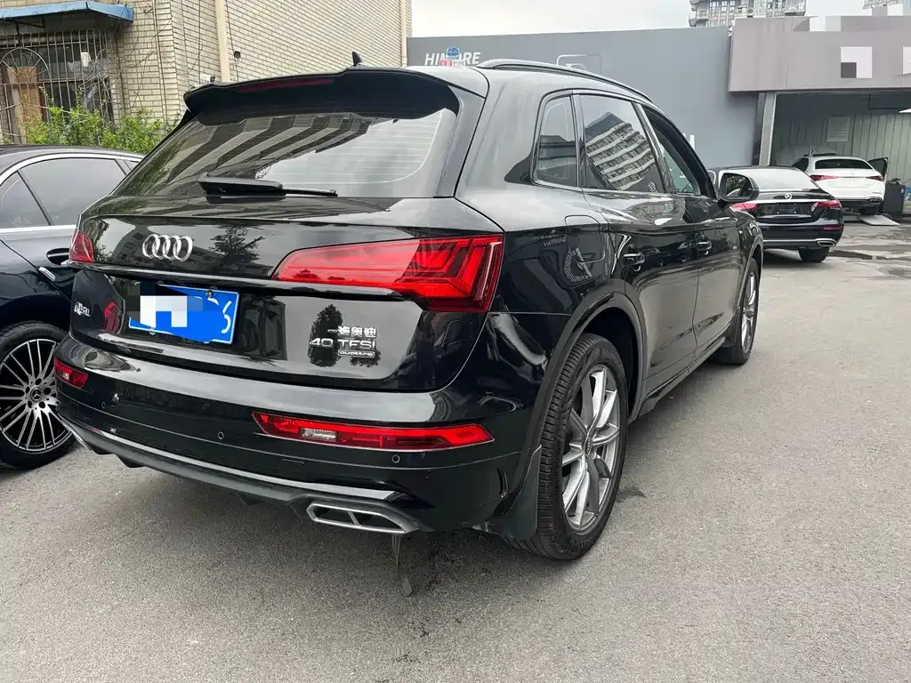 Audi Q5L — фото 10