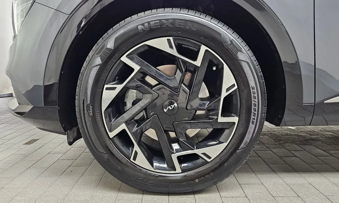 Kia Sportage — фото 10