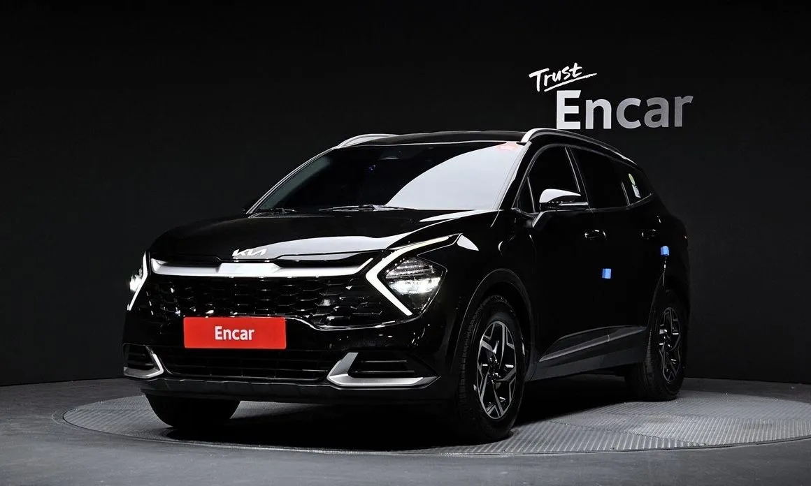 Kia Sportage — фото 1