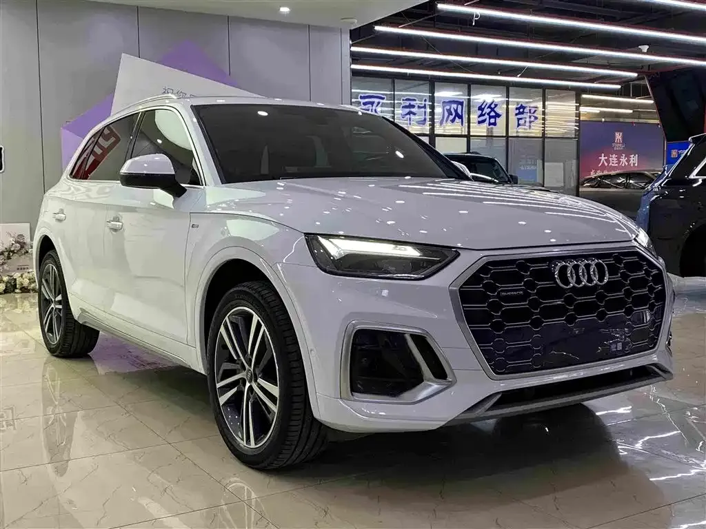 Audi Q5L — фото 10