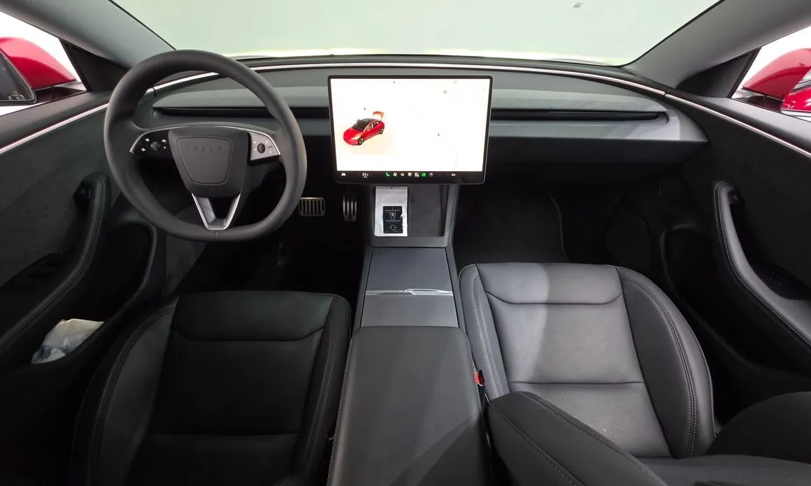 Tesla Model 3 — фото 9