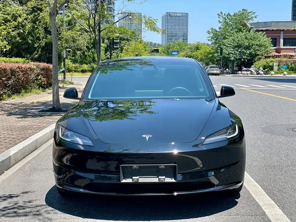 Tesla Model 3 — фото 7