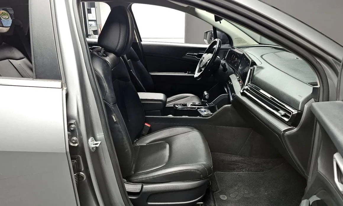 Kia Sportage — фото 9