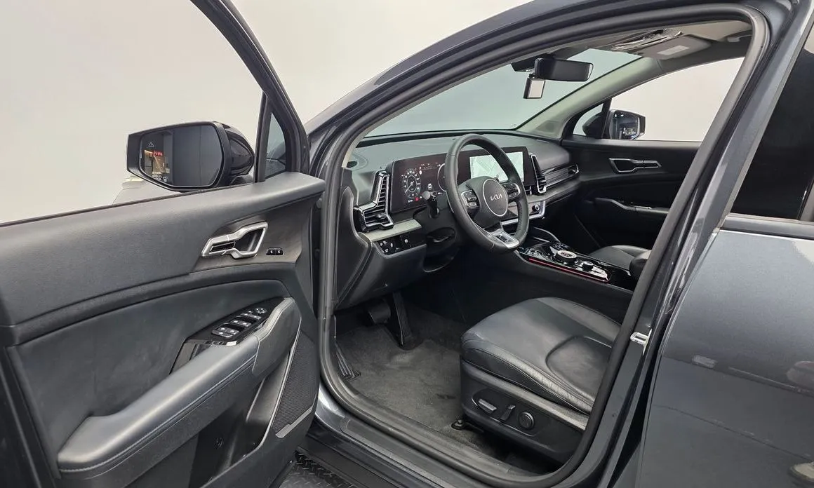 Kia Sportage — фото 10