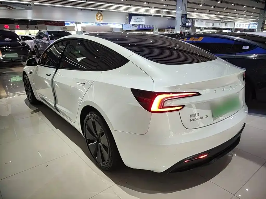 Tesla Model 3 — фото 7