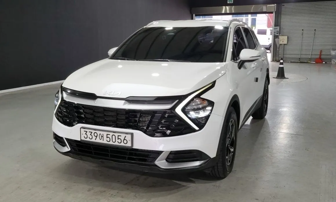 Kia Sportage — фото 1