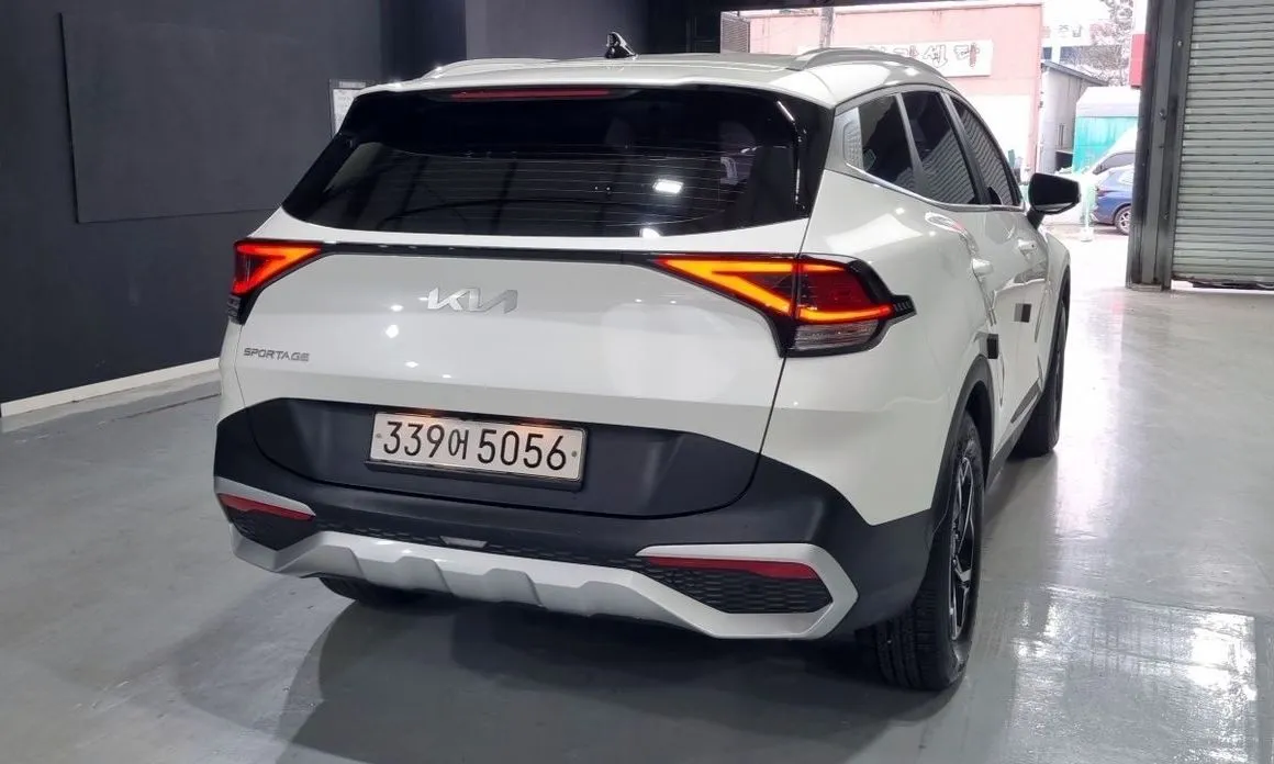 Kia Sportage — фото 7