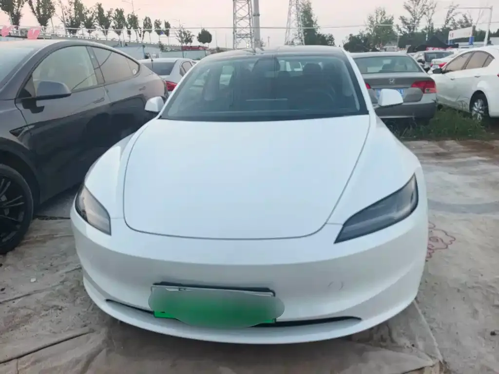 Tesla Model 3 — фото 7