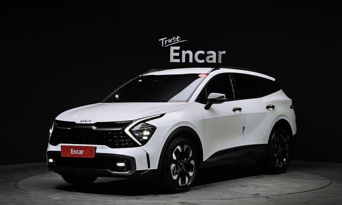 Kia Sportage — фото 1