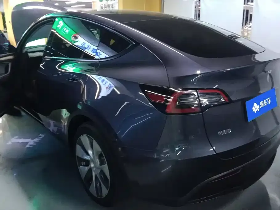 Tesla Model Y — фото 10