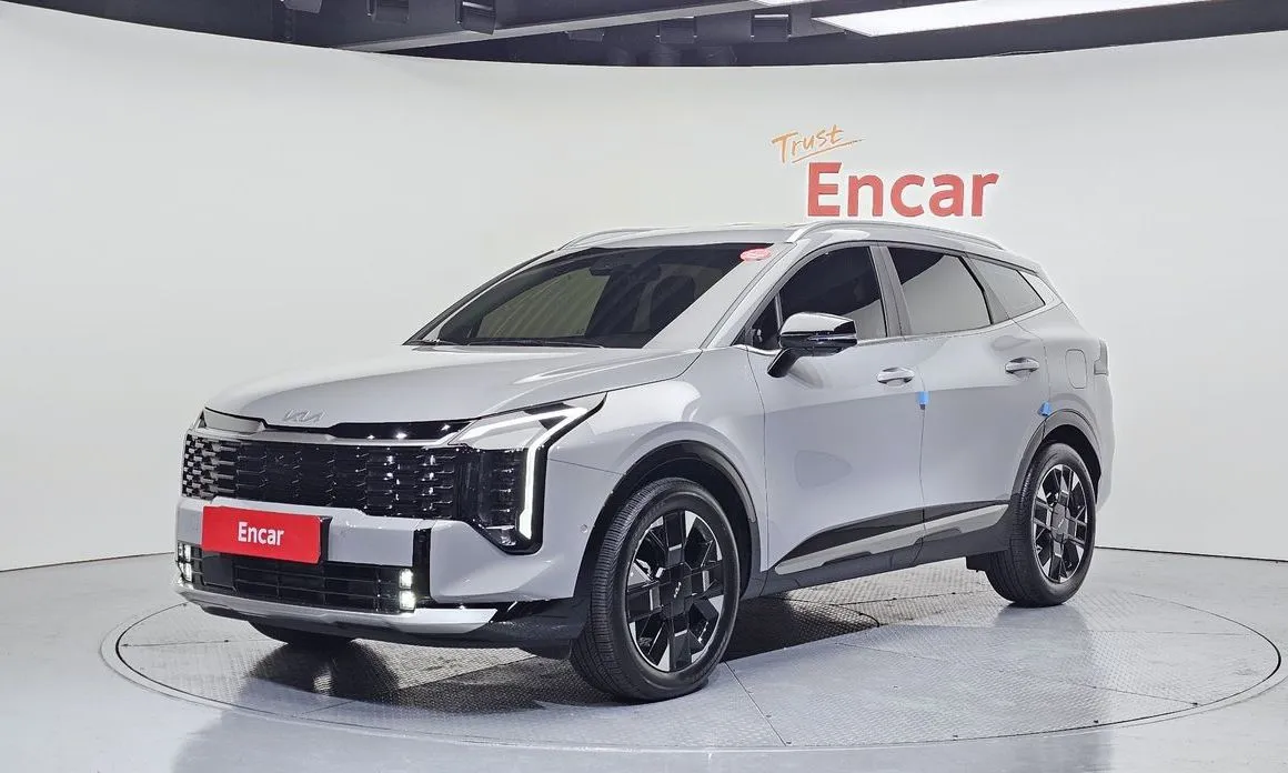 Kia Sportage — фото 1