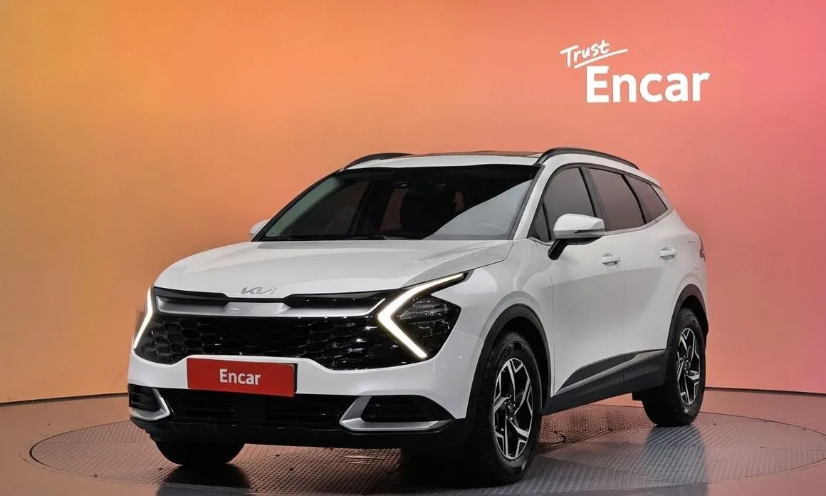 Kia Sportage — фото 1