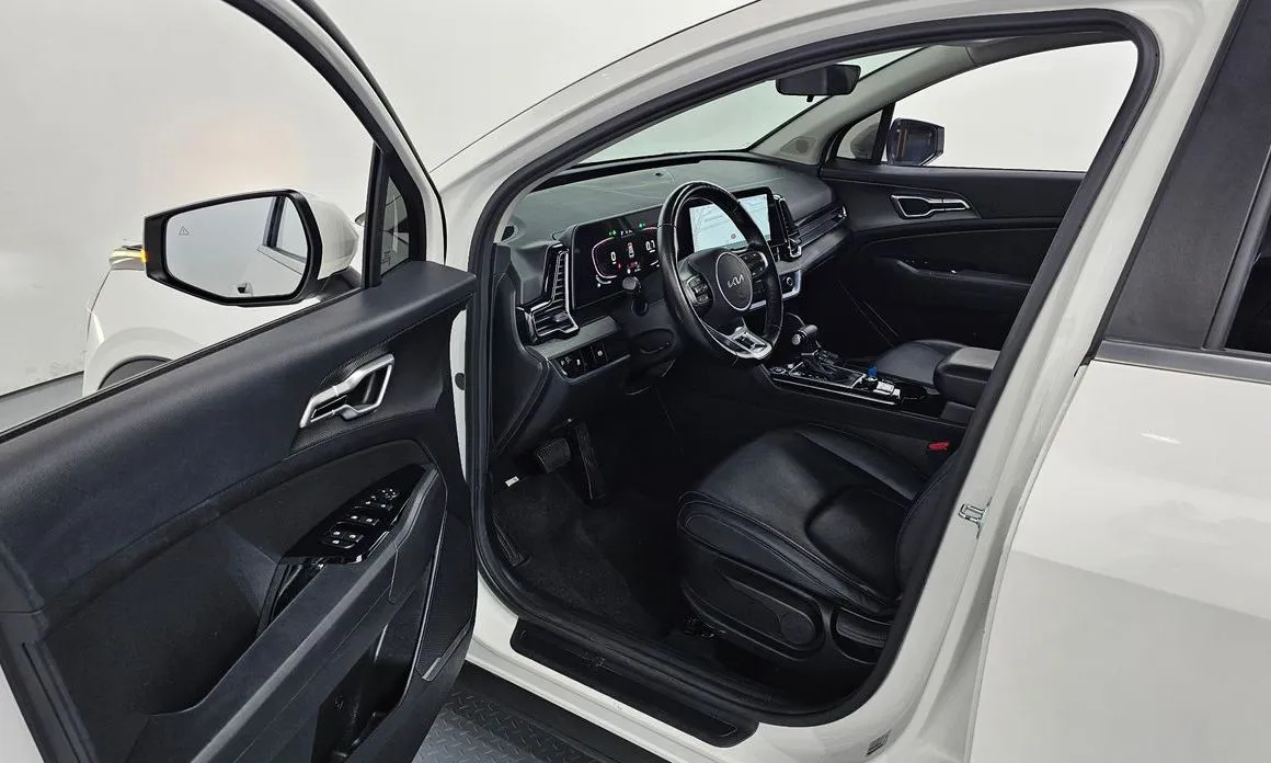 Kia Sportage — фото 10
