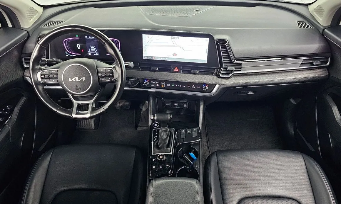 Kia Sportage — фото 9