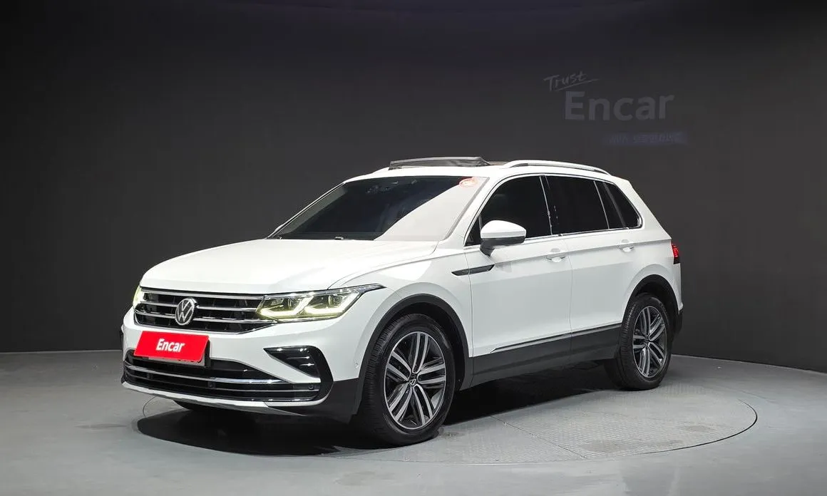 Volkswagen Tiguan — фото 1