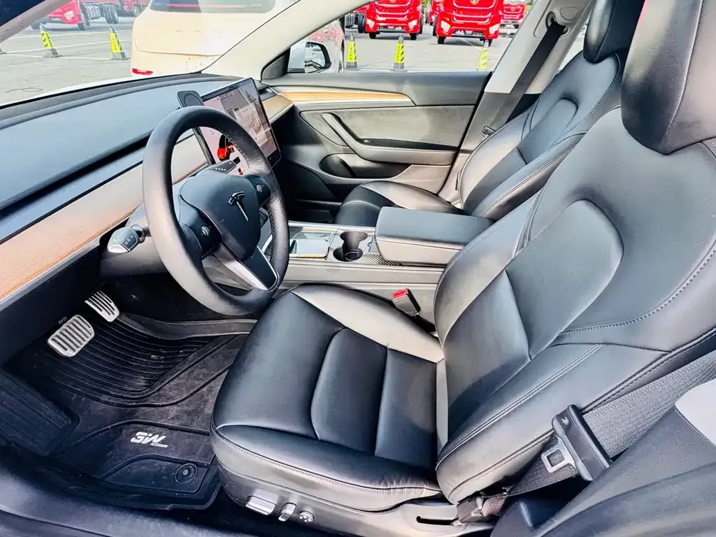Tesla Model 3 — фото 8