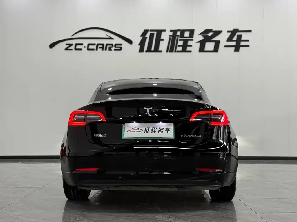 Tesla Model 3 — фото 10