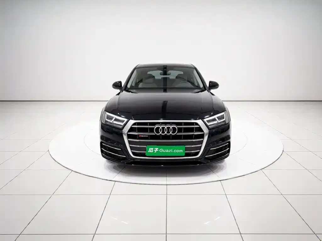 Audi Q5L — фото 6