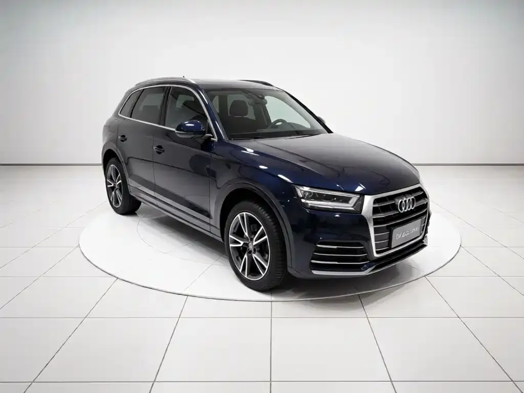 Audi Q5L — фото 5
