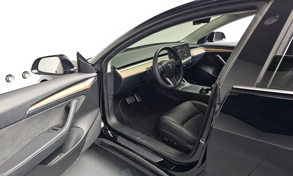 Tesla Model 3 — фото 10