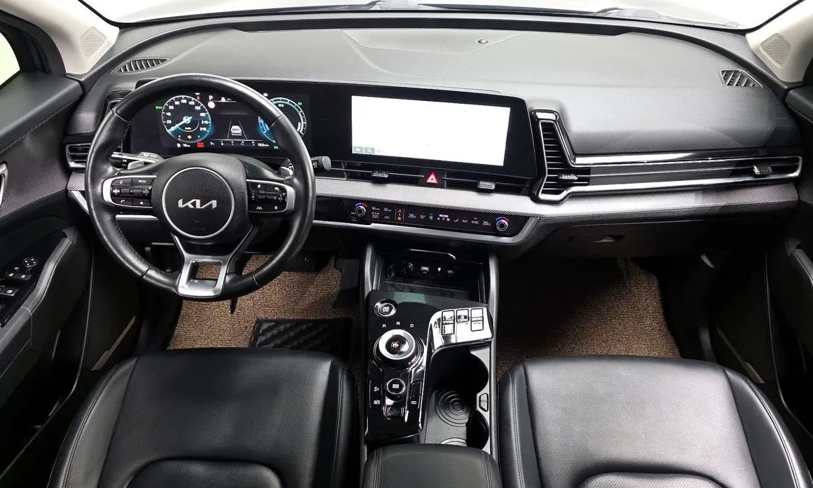Kia Sportage — фото 10