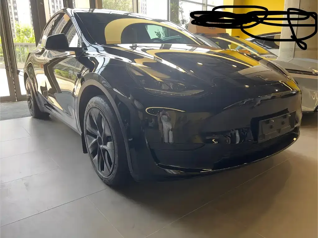 Tesla Model Y — фото 5