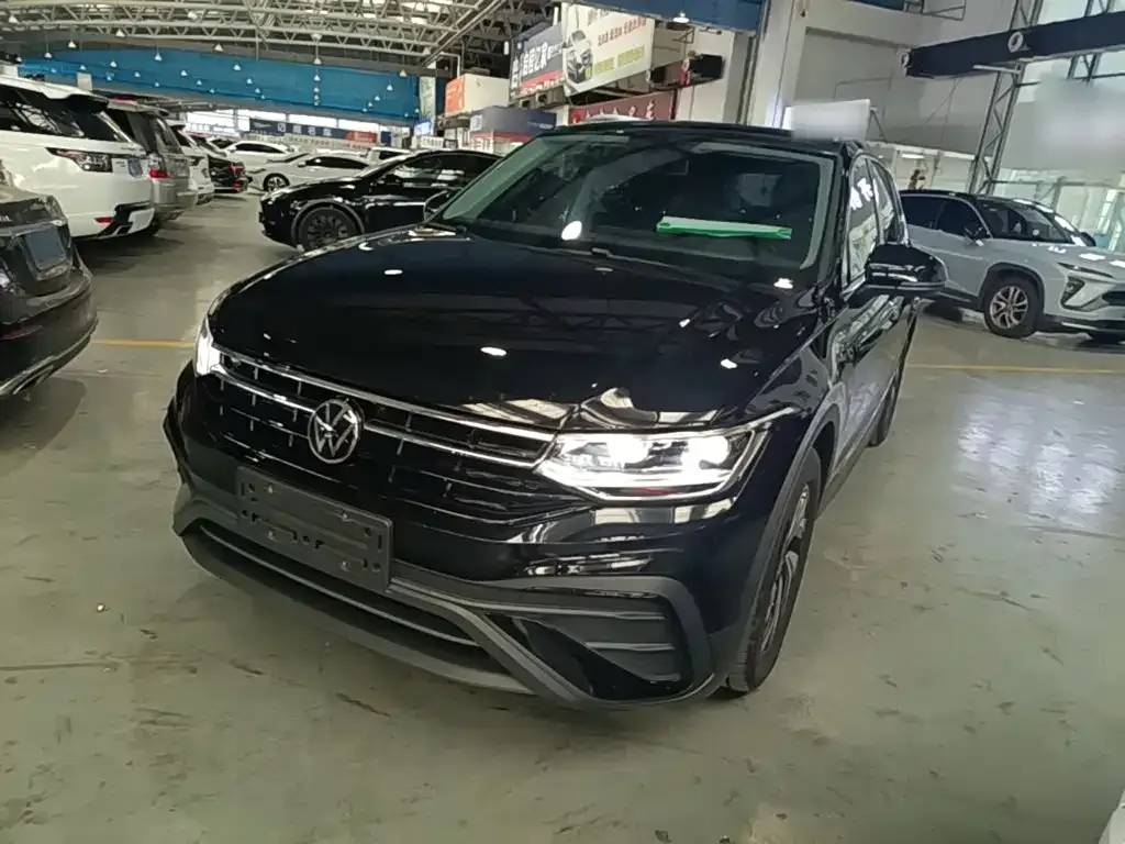 Volkswagen Tiguan L — фото 3