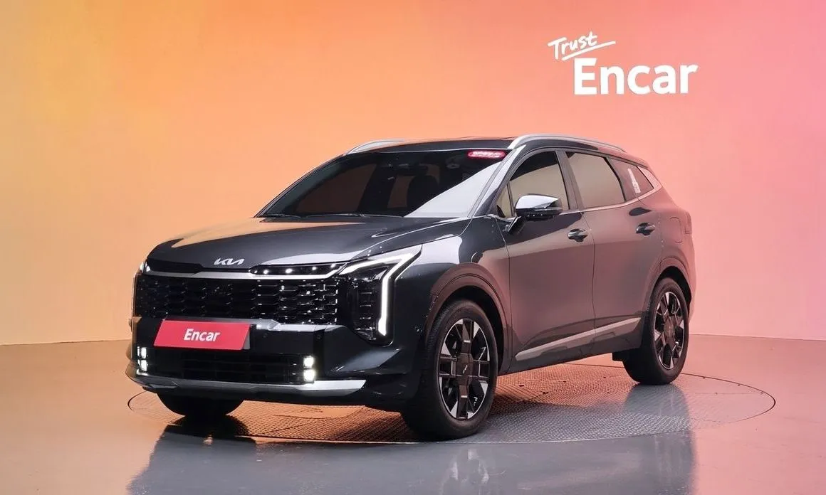 Kia Sportage — фото 1