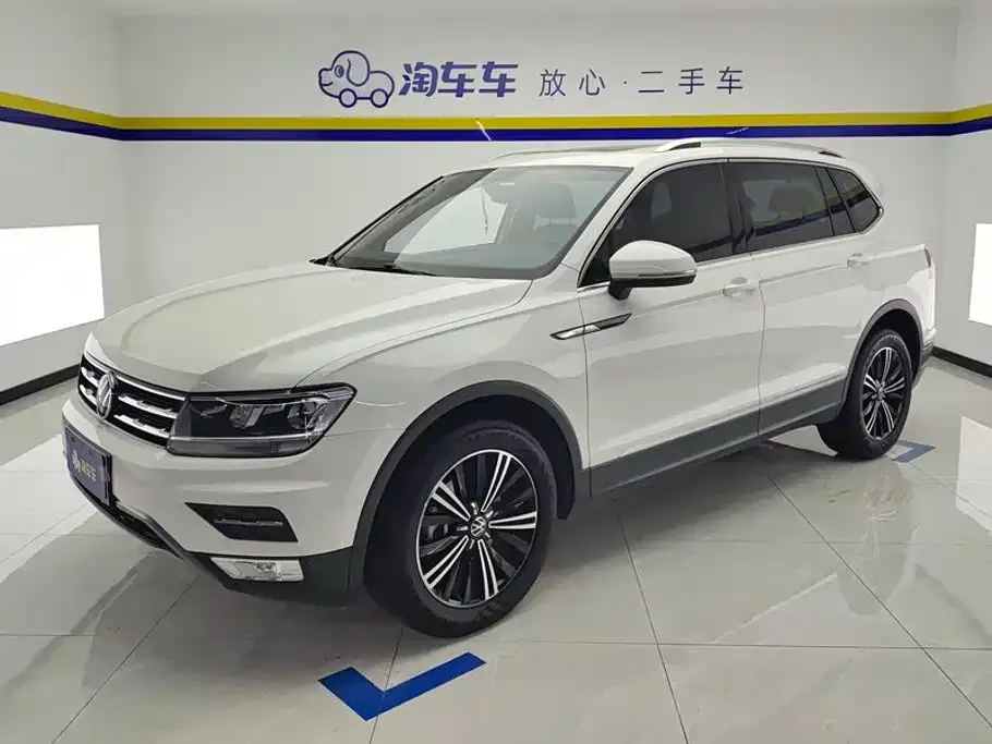Volkswagen Tiguan L — фото 1