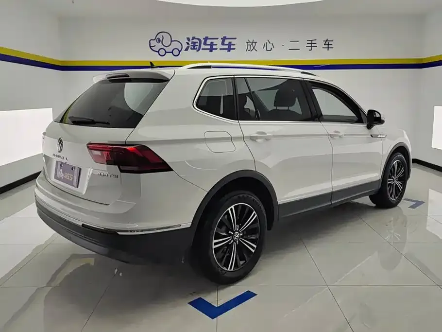 Volkswagen Tiguan L — фото 2