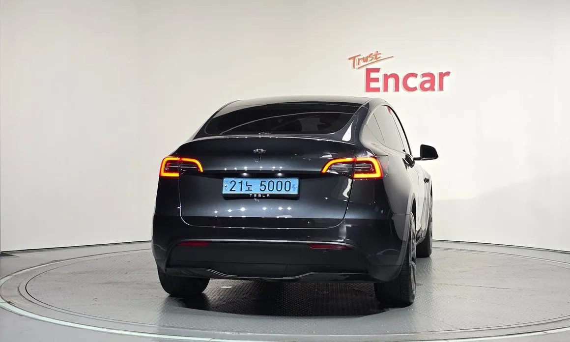 Tesla Model Y — фото 7