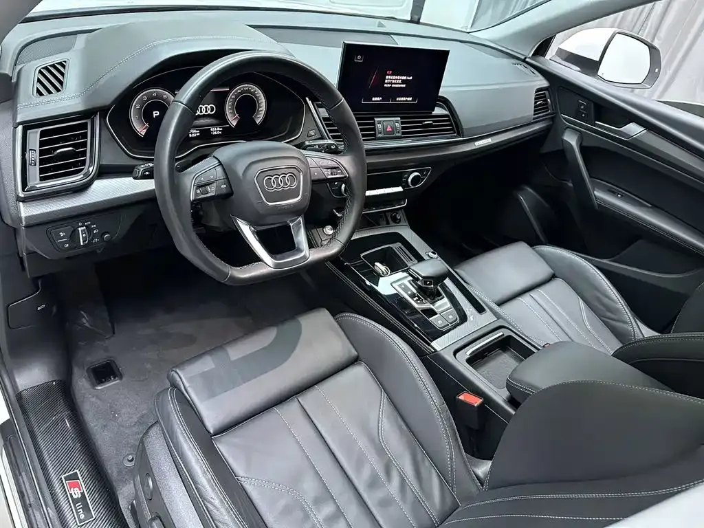 Audi Q5L — фото 9