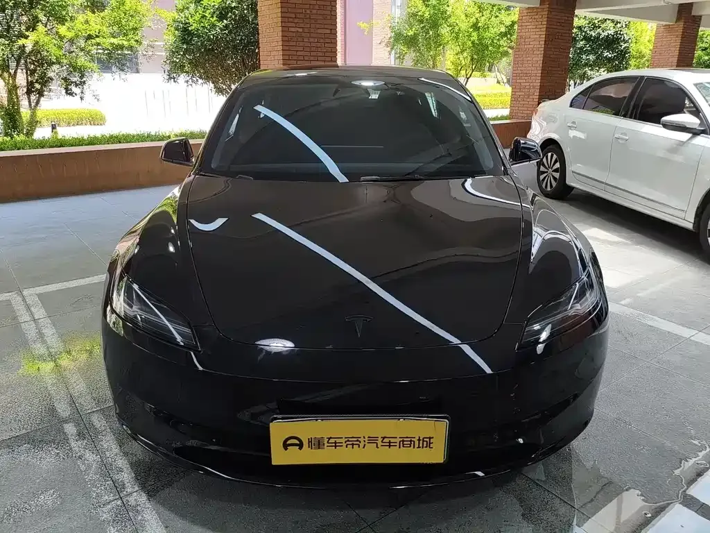 Tesla Model 3 — фото 10