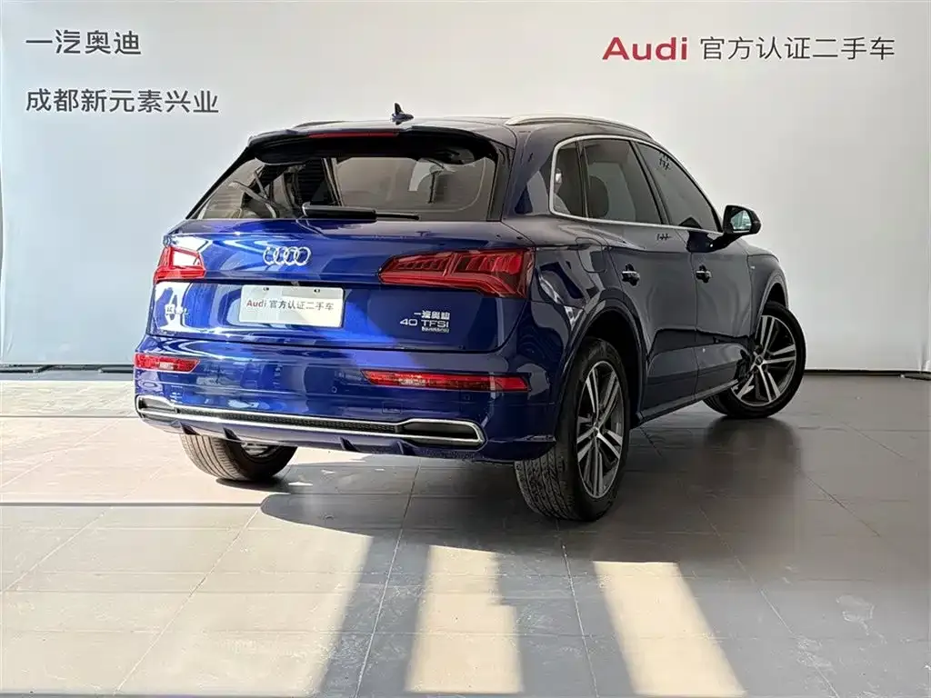 Audi Q5L — фото 8