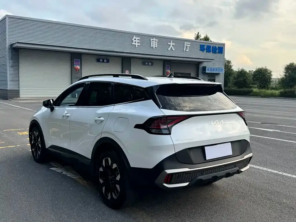 Kia Sportage — фото 9