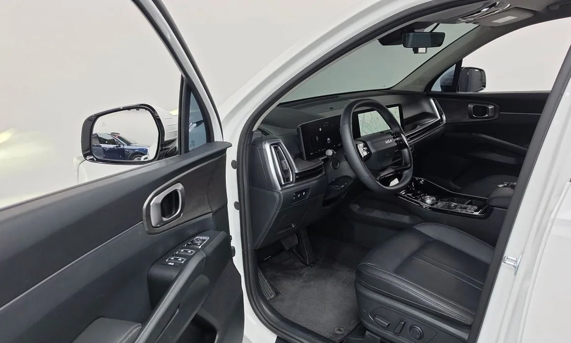 Kia Sorento — фото 7