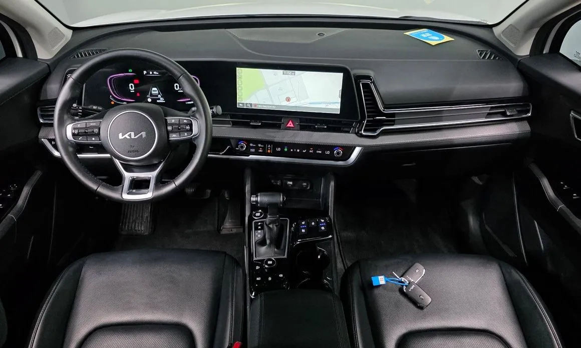 Kia Sportage — фото 10
