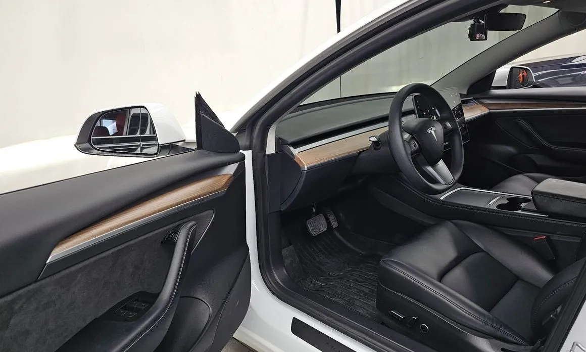 Tesla Model 3 — фото 10
