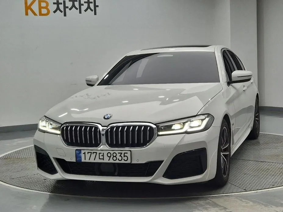 BMW 5-Series — фото 1