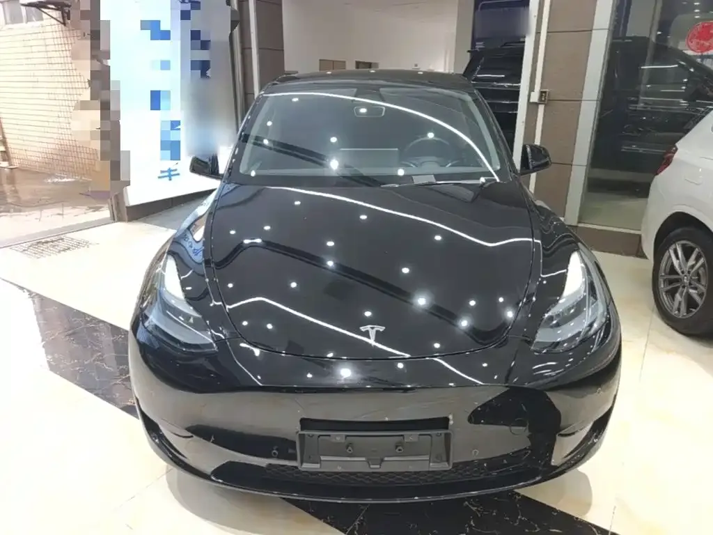 Tesla Model Y — фото 10