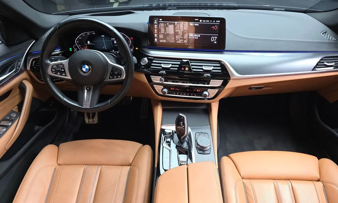 BMW 5-Series — фото 10