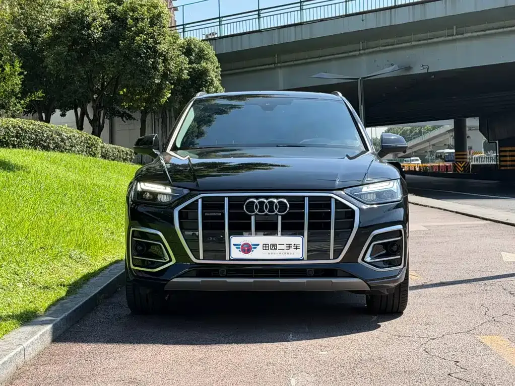 Audi Q5L — фото 10