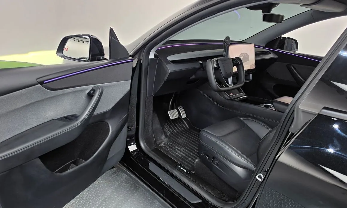 Tesla Model Y — фото 8